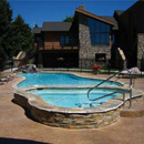 Residential curved kidney-shaped swimming pool